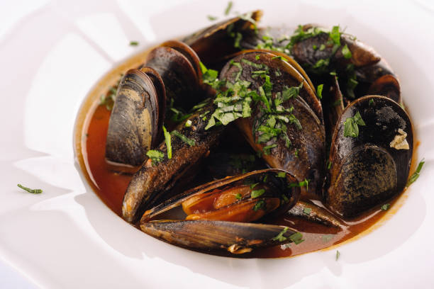 istock Mussels close up on white background 1415166942