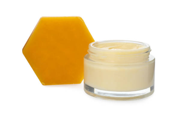 istock Cream and natural beeswax on white background 1415167155