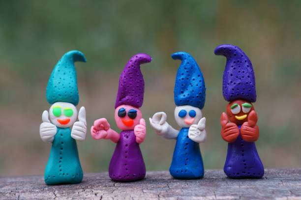 istock Funny happy gnomes make a class gesture and a thumbs up gesture. 1415169688