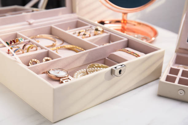 istock Jewelry box with stylish golden bijouterie on white table 1415172948