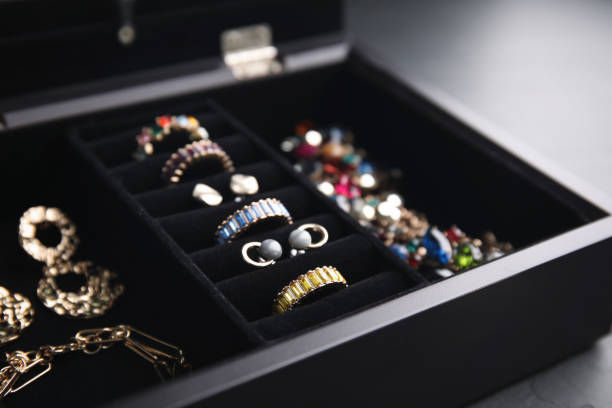 istock Jewelry box with stylish bijouterie on table, closeup 1415172949