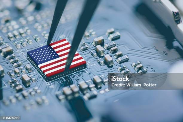 Flag Of Usa On A Processor Cpu Central Processing Unit Or Gpu Microchip On A Motherboard Congress Passes The Chips Act Of 2022 To Strengthen Domestic Semiconductor Manufacturing Research And Design Stock Photo - Download Image Now
