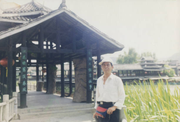 istock 1990s Chinese Men Real Life old photo 1415180635