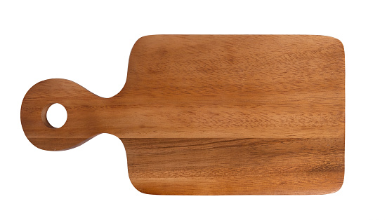 Top view of Brown hardwood cutting board for kitchen accessories square shape with handles and hole for hanging. on a white background.