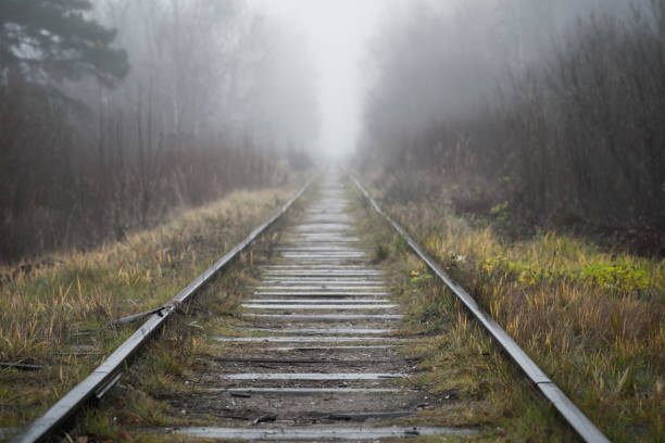 istock Perspective view of an old abandoned railway 1415186681