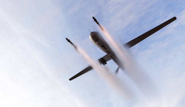 istock Military combat drone UAV launching missiles 1415187672
