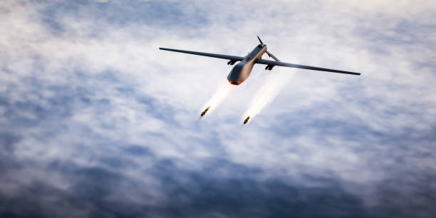 istock Military combat drone UAV launching missiles 1415187681