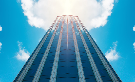 underside panoramic and perspective view to steel blue glass high rise building skyscrapers, business concept of successful industrial architecture