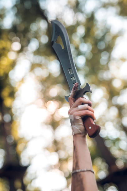 istock sharp knife in female hand at outdoor 1415194286