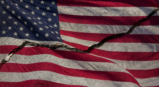 Divided America - Cracked American Flag stock photo