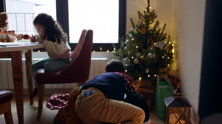 Little girl drawing Christmas cards