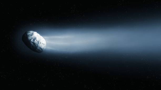 istock Long gas tail and bright comet nucleus. Dangerous comet in space. 1415198448