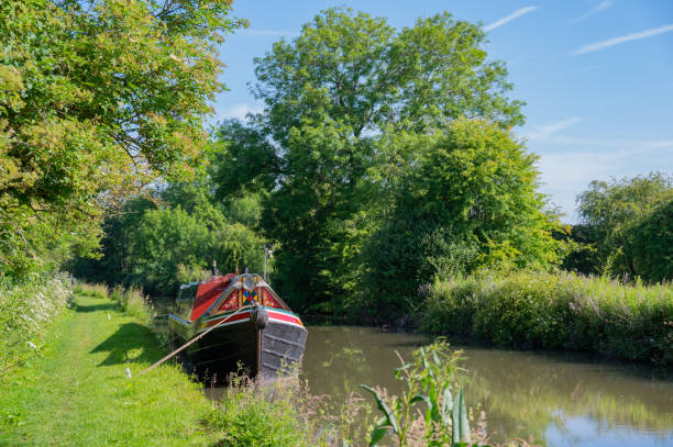 istock Boat on Brinklow canal in the countryside 1415200484