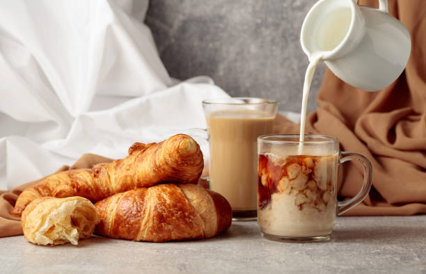 istock Croissants and coffee with cream. 1415203332