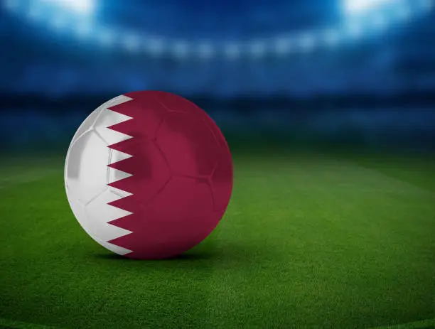 Football soccer ball with team national flags. World football Qatar flag on 3d ball.