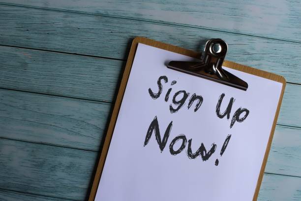 istock Paper clipboard with text Sign Up Now! 1415206783