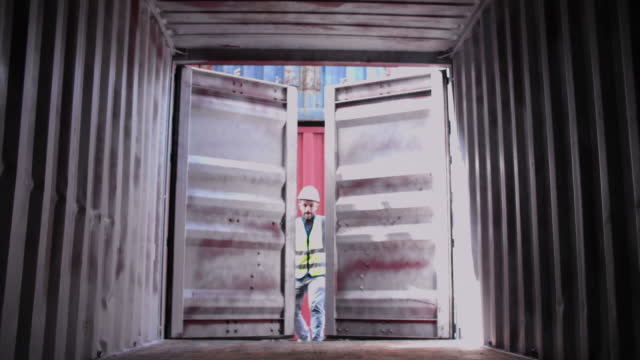 Opening the Door of a Container Warehouse