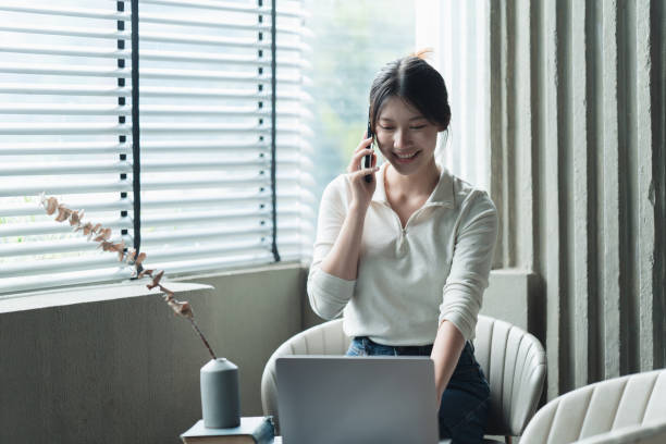 istock young beautiful girl using mobile phone 1415209898