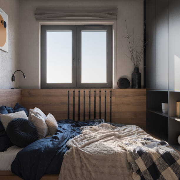 istock Small and cozy bedroom with window 1415211508