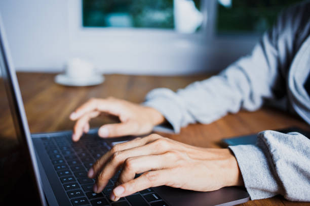 istock Hand People are using keyboards to search and scroll through laptops and search on online website 1415212690