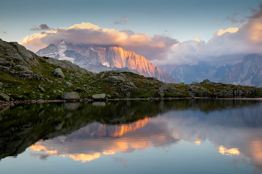 The Grand Jorasses reflection into cheserys lake at sunset - France