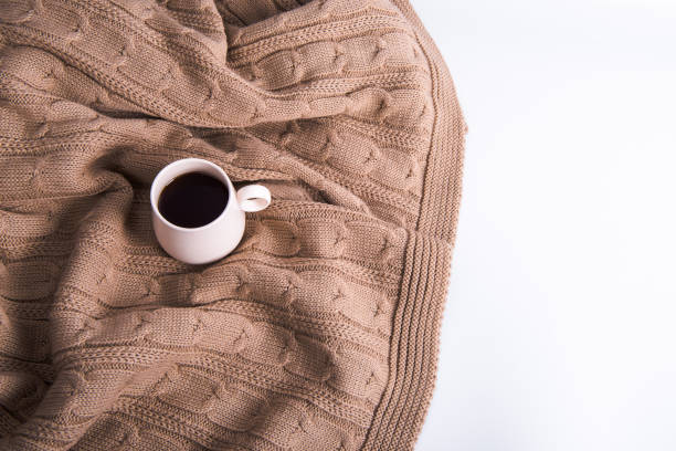 istock The cup of coffee on the plaid 1415214195