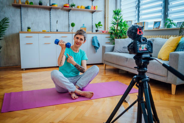 istock Woman vlogging about exercising 1415217649
