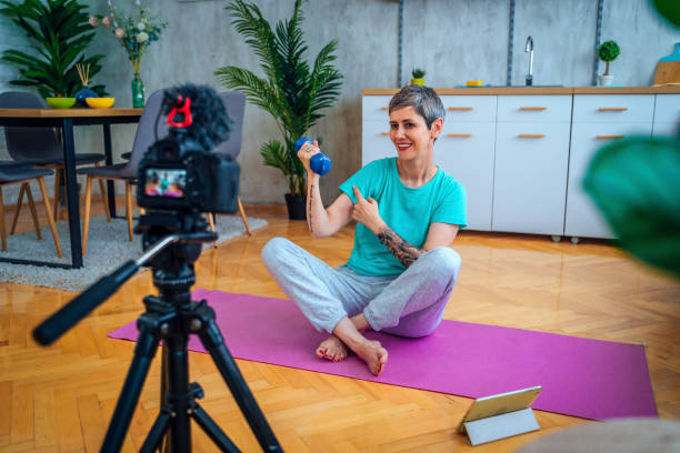 istock Woman vlogging about exercising 1415217740