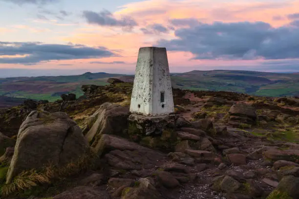 View of Roach End in the Peak District from the Trig Point with pastel dawn light
