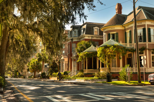 istock Old classical homes on a Savannah Georgia USA road 1415224205