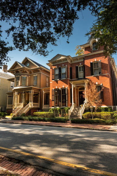 istock Old classical homes on a Savannah Georgia USA road 1415224218