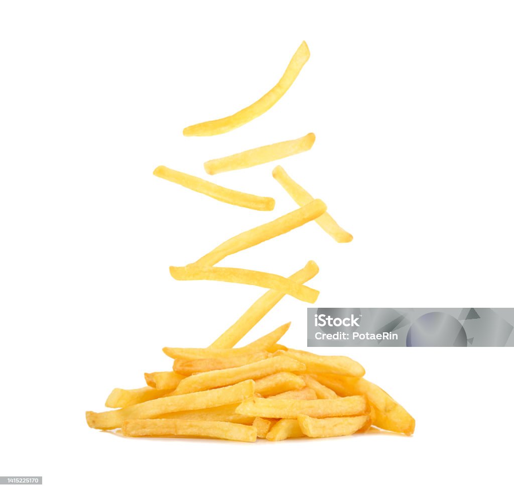 French fries falling in the air isolated on white Heap of french fries isolated on white background. American Culture Stock Photo