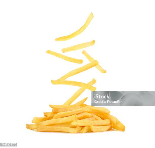 French Fries Falling In The Air Isolated On White Stock Photo - Download Image Now - American Culture, Appetizer, Buffet