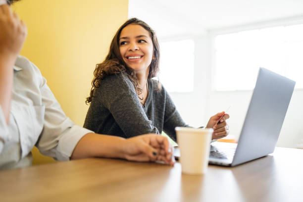 istock Women shopping online on laptop 1415229087