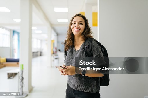 istock Portrait of a smiling college student 1415229097