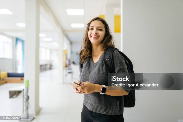 Portrait Of A Smiling College Student Stock Photo - Download Image Now - Student, Trainee, University