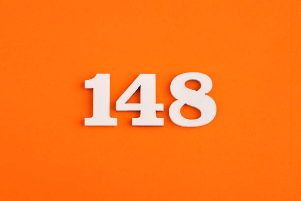 istock Number 148 - On orange foam rubber background 1415230514