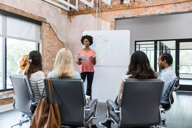 istock Diverse small business owners get advice from financial consultant 1415231372