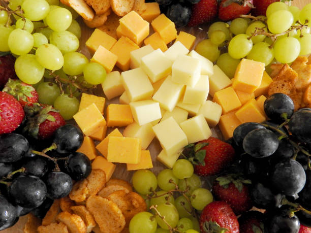 istock Top view of cheese and grape varieties 1415231674