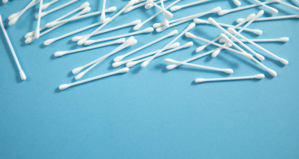 istock Cotton buds or swabs for ear cleaning on the blue background. 1415233082