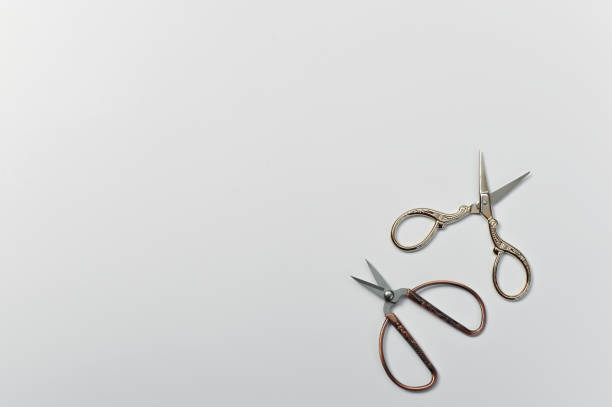 istock Small scissors on a white background. Scissors for manicure or for a seamstress. 1415234115