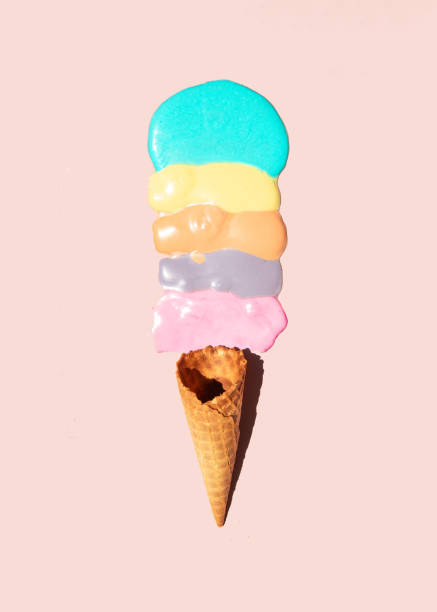 istock Pastel malted ice cream and cone on light pastel pink background. Creative food concept. Minimalistic sweets composition. Sunny summer day idea. 1415237091
