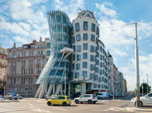 Modern office building called Dancing House Tancici dum by architect Frank Gehry Prague, Czech Republic - June 2022: modern office building called Dancing House Tancici dum by architect Frank Gehry dancing house prague stock pictures, royalty-free photos & images