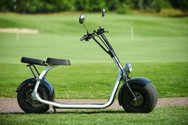 istock electric luxury scooter on green lawn background 1415239157