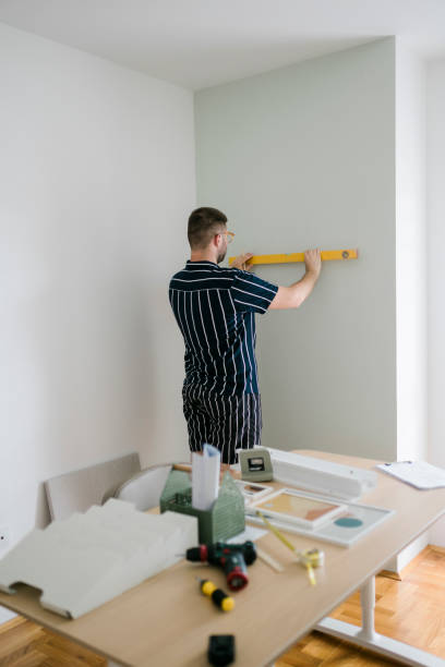 istock Young man renovating his home 1415240038