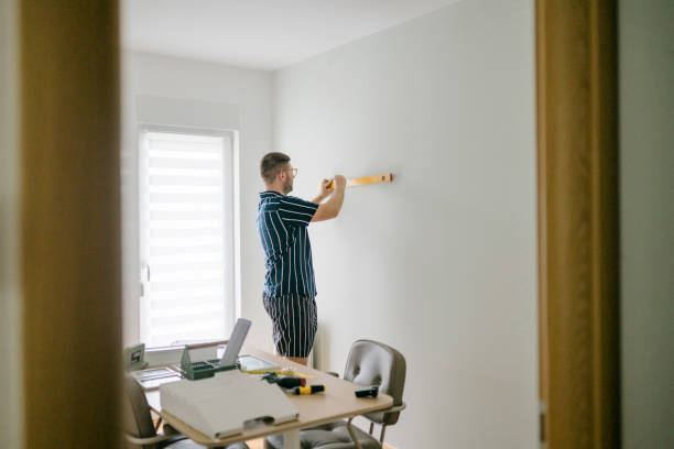 istock Young man renovating his home 1415240527