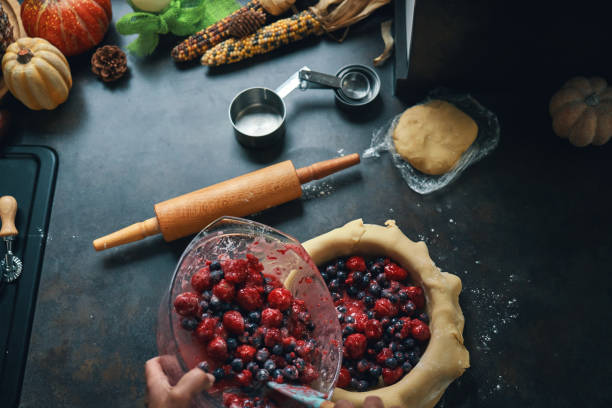 istock Preparing Berry Pie in Domestic Kitchen 1415242865