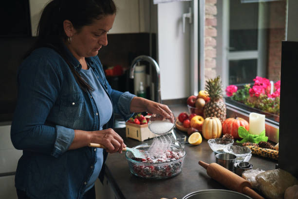 istock Preparing Berry Pie in Domestic Kitchen 1415242914
