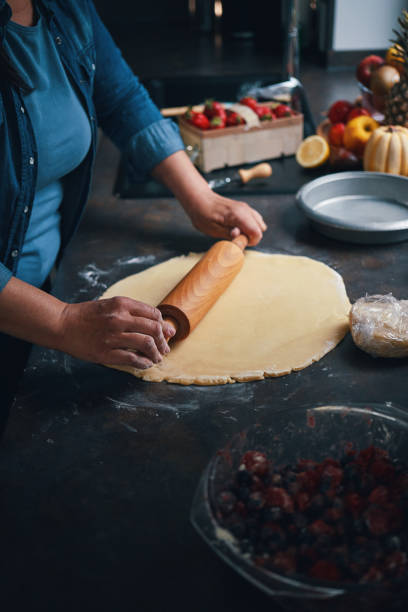 istock Preparing Berry Pie in Domestic Kitchen 1415242924