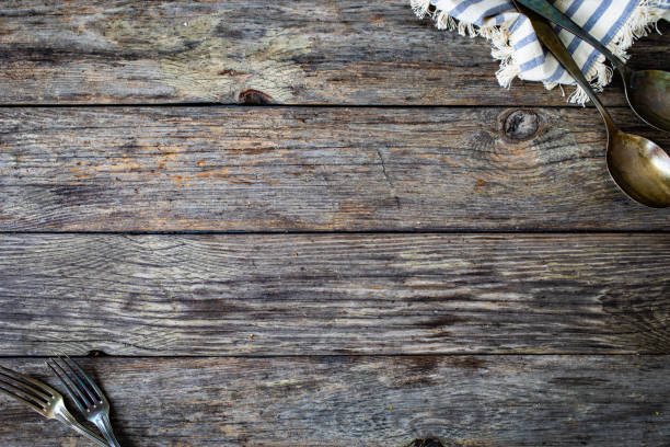 istock Wood grain texture - empty pine boards with two forks on 1415243667